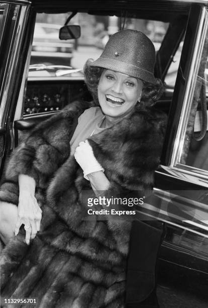 American singer Kay Starr stepping out of a car, London, UK, 13th November 1983.