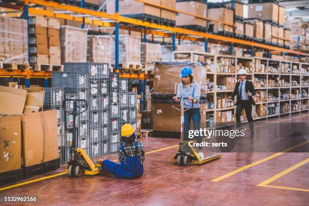 accident at work in warehouse - workplace first aid kit stock pictures, royalty-free photos & images