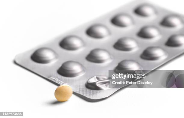 thyroxine pills in blister pack - hormone stock pictures, royalty-free photos & images