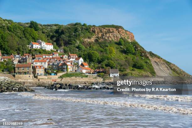 sunny morning at runswick bay, north yorkshire, england - runswick bay stock pictures, royalty-free photos & images