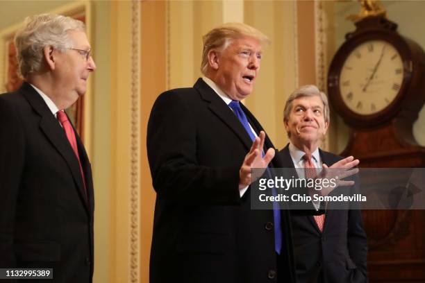 President Donald Trump answers questions from the media alongside U.S. Senate Majority Leader Sen. Mitch McConnell and Sen. Roy Blunt after arriving...