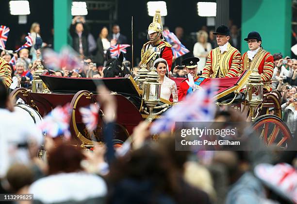 Their Royal Highnesses Prince William, Duke of Cambridge and Catherine, Duchess of Cambridge journey by carriage procession to Buckingham Palace...