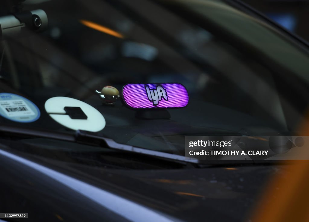 Lyft Ride Sharing A Lyft ride-sharing car is seen on Park Avenue in New York City March ...