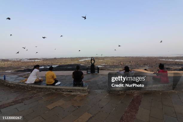 Women perform yoga by the seaside in Mumbai, India on 26 March 2019. The Central Board of Secondary Education is set to introduce Yoga as elective...