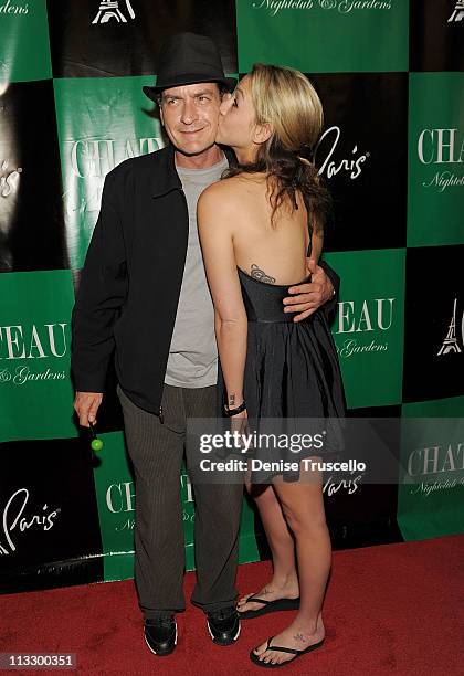 Charlie Sheen and Natalie Kenly arrive at Chateau Nightclub & Gardens on April 30, 2011 in Las Vegas, Nevada.