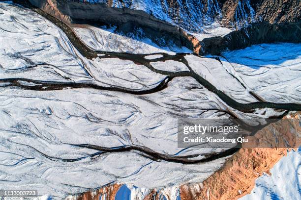 xinjiang anjihai grand canyon at dusk - bathing ghat stock pictures, royalty-free photos & images