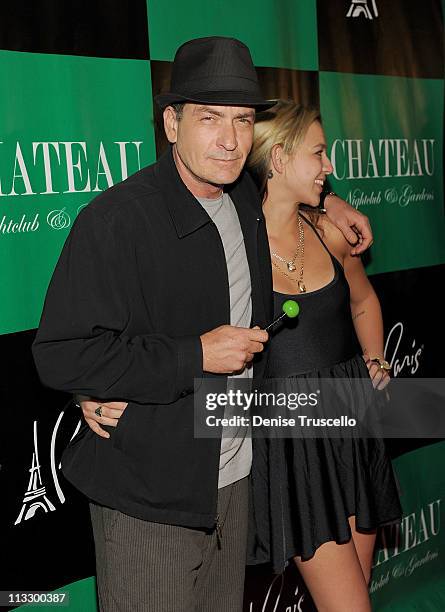 Charlie Sheen and Natalie Kenly arrive at Chateau Nightclub & Gardens on April 30, 2011 in Las Vegas, Nevada.