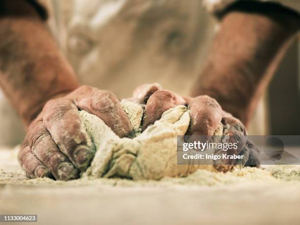 baker kneading dough - hands kneading stock pictures, royalty-free photos & images