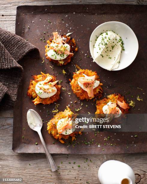 tray of autumn rosti and sour cream - sour cream stock pictures, royalty-free photos & images