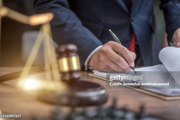 judge gavel with justice lawyers, businesswoman in suit or lawyer, advice and legal services concept. - legal agreement stock-fotos und bilder