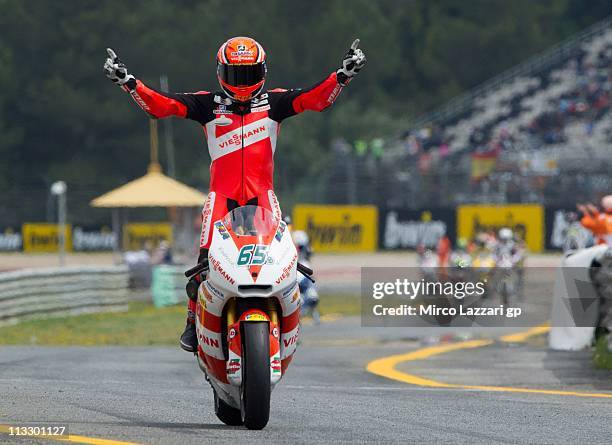 Stefan Bradl of Germany and Viessmann Kiefer Racing celebrates the victory at the end of the Moto2 race of MotoGP of Portugal on May 1, 2011 in...