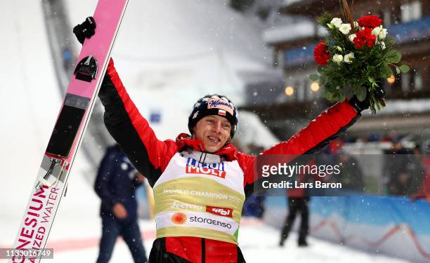 Dawid Kubacki of Poland celebrates after he wins the gold medal in the ski jumping Men's HS109 final round during the 2019 FIS World Ski...