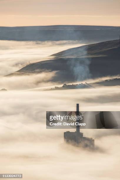 cement works amongst the mist in the peak district - cement factory stock pictures, royalty-free photos & images
