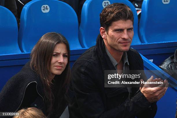 Mario Gomez of FC Bayern Muenchen and girlfriend Silvia Meichel attend the final match between Florian Mayer of Germany and Nikolay Davydenko of...