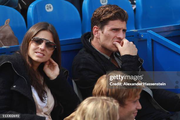 Mario Gomez of FC Bayern Muenchen and girlfriend Silvia Meichel attend the final match between Florian Mayer of Germany and Nikolay Davydenko of...