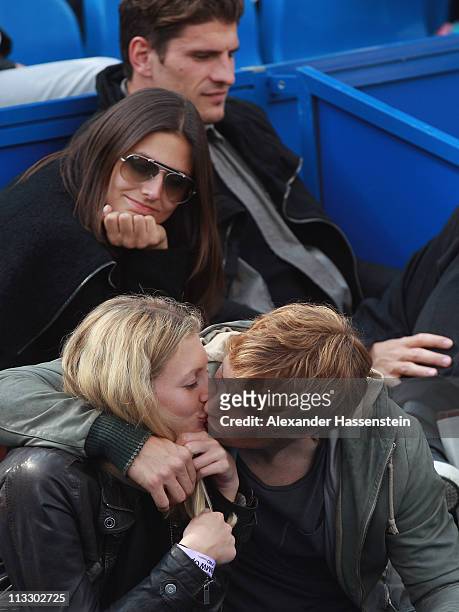 Andreas Ottl of FC Bayern Muenchen attends with his girlfriend Veronika and his team mate Mario Gomez with girlfriend Silvia Meichel the final match...