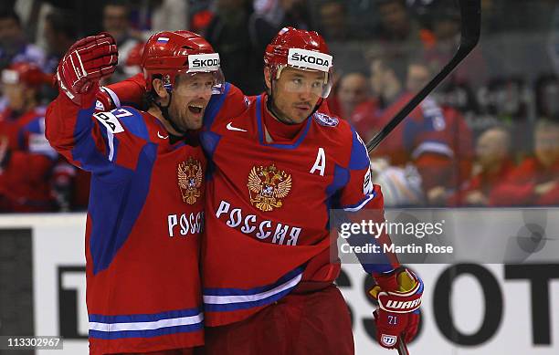 Vitali Atyushov of Russia celebrate with team mate Ilya Kovalchuk after he scores his team's 1st goal during the IIHF World Championship group A...