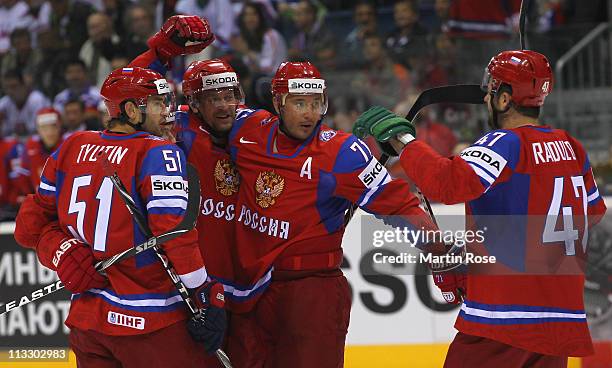 Vitali Atyushov of Russia celebrate with team mate Ilya Kovalchuk after he scores his team's 1st goal during the IIHF World Championship group A...