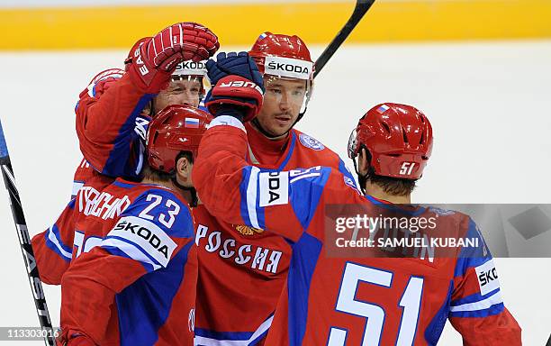 Russia's players celebrate after scoring during the IIHF Ice Hockey World Championship group A match against Slovenia in Bratislava on May 1, 2011....