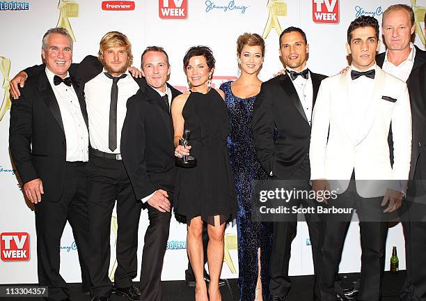The cast of Underbelly: The Golden Mile pose with their Silver Logie for Most Outstanding Drama Series in the media room during the 2011 Logie Awards...