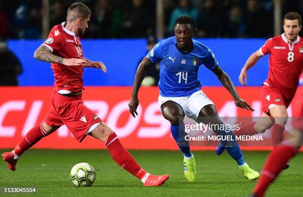 Italy's forward Moise Kean dribbles Liechtenstein's defender Sandro Wieser during the Euro 2020 Group J qualifying football match Italy vs...