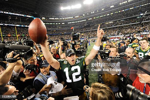Aaron Rodgers of the Green Bay Packers celebrates after defeating the Pittsburgh Steelers in Super Bowl XLV on February 6, 2011 at Cowboys Stadium in...