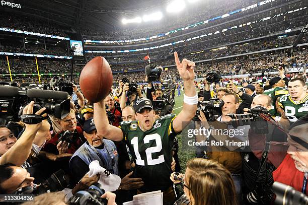 Aaron Rodgers of the Green Bay Packers celebrates after defeating the Pittsburgh Steelers in Super Bowl XLV on February 6, 2011 at Cowboys Stadium in...