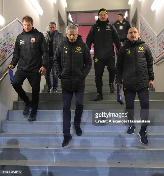 Lucien Favre, head coach of Dortmund walks down the stairs in the players tunnel at the start of the second half during the Bundesliga match between...
