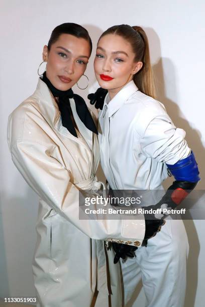 Models Bella Hadid and her sister Gigi Hadid attend the LVMH Prize 2019 Edition at Louis Vuitton Avenue Montaigne Store on March 01, 2019 in Paris,...