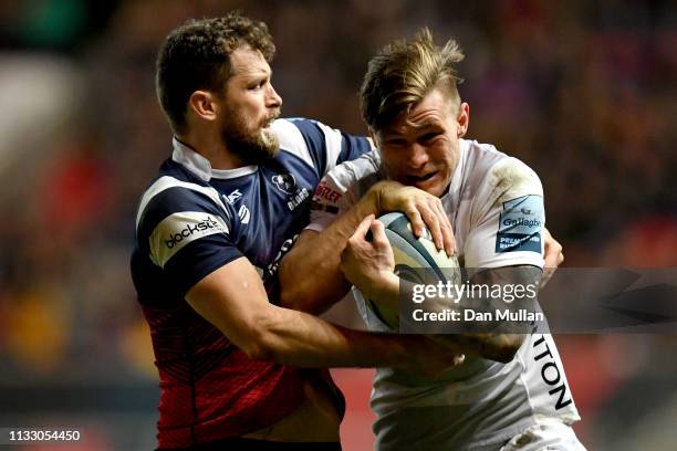 Jason Woodward of Gloucester Rugby is tackled by Luke Morahan of Bristol Bears during the Gallagher Premiership Rugby match between Bristol Bears and...