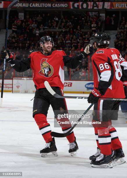 Ben Harpur and Christian Wolanin of the Ottawa Senators celebrate a third period goal the Buffalo Sabres by Magnus Paajarvi at Canadian Tire Centre...