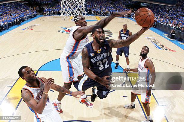 Mayo of the Memphis Grizzlies shoots against Serge Ibaka of the Oklahoma City Thunder in Game One of the Western Conference Semifinals in the 2011...