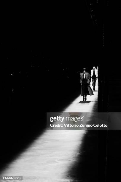 Model walks the runway during the Saint Laurent show as part of the Paris Fashion Week Womenswear Fall/Winter 2019/2020 on February 26, 2019 in...