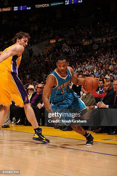 New Orleans Hornets shooting guard Willie Green brings the ball up court during the game against the Los Angeles Lakers in Game Five of the Western...