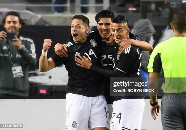 Mexico's Javier Hernandez celebrates with teammates after scoring a goal during the international friendly match between Mexico and Paraguay at...