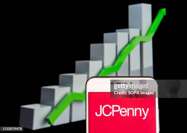 In this photo illustration a American department store chain JCPenney logo is seen on an android mobile device with an ascent growth chart in the...