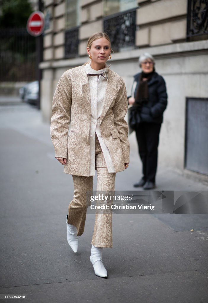 Street Style - Paris Fashion Week Womenswear Fall/Winter 2019/2020 : Day Five