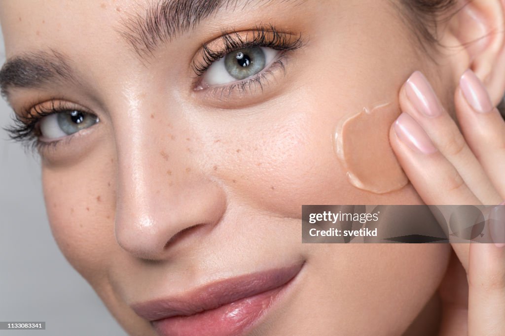 Perfect Skin Example Young Woman With Perfect Skin Applying Foundation High-Res Stock Photo ...