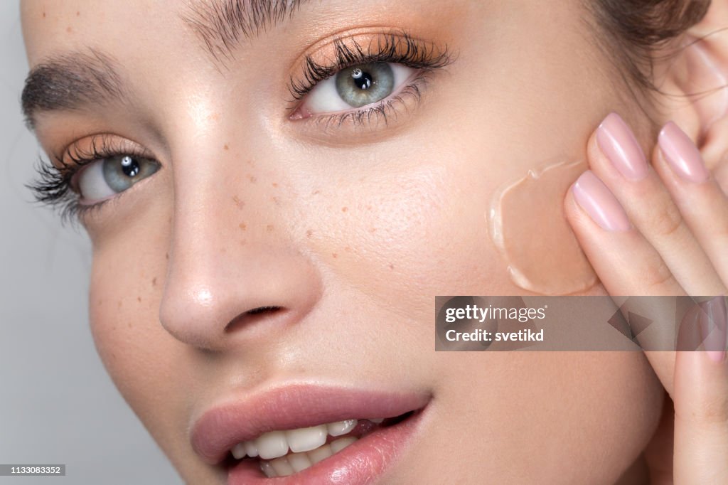 Perfect Skin Example Young Woman With Perfect Skin Applying Foundation High-Res Stock Photo ...