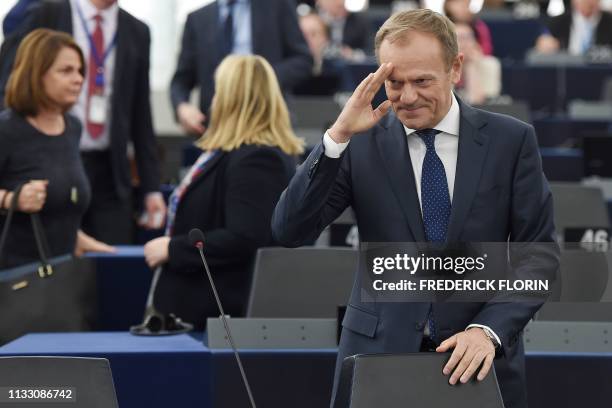 European Council President Donald Tusk gestures as he arrives for a debate on the priorities of the European Council meeting of 21 and 22 March 2019...