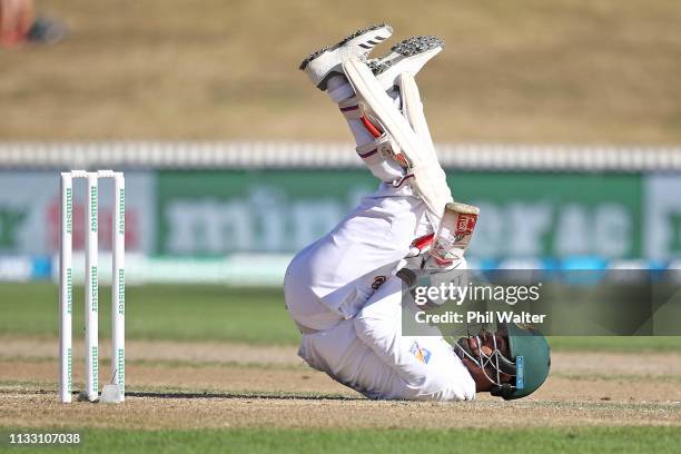 Tamim Iqbal of Bangladesh fals over as he bats during day three of the First Test match in the series between New Zealand and Bangladesh at at Seddon...