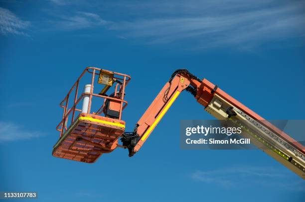 cherrypicker aerial work platform construction crane - work platform stock pictures, royalty-free photos & images
