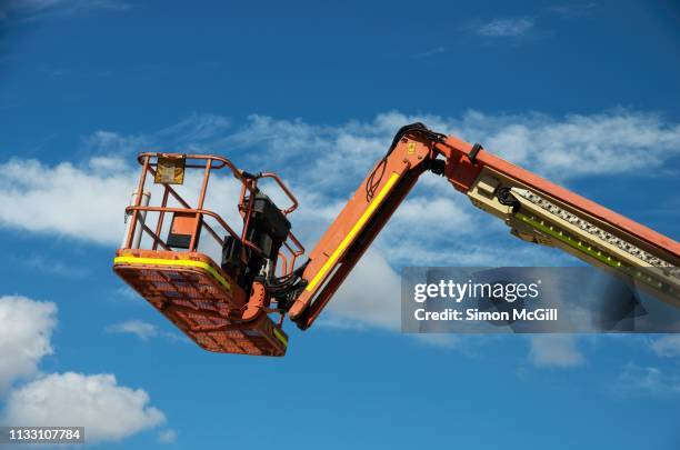cherrypicker aerial work platform construction crane - work platform stock pictures, royalty-free photos & images
