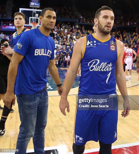 Injured Bullets player Mika Vukona and Bullets player Adam Gibson look on after the loss during game two of the NBL Semi Final Series between the...