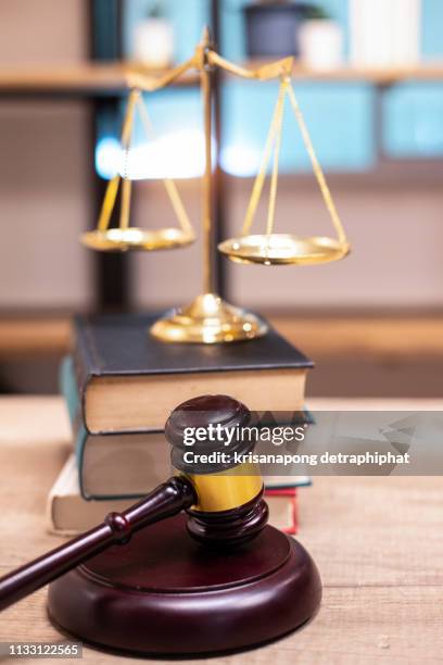 justice scales and books and wooden gavel - prosecuting attorney stock pictures, royalty-free photos & images