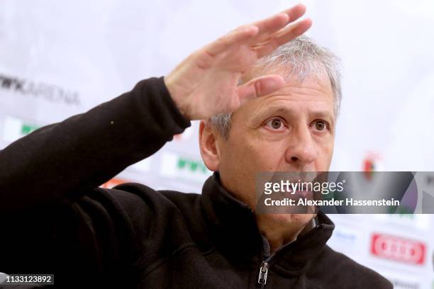 Lucien Favre, head coach of Dortmund talks to the media during a press conference after the Bundesliga match between FC Augsburg and Borussia...