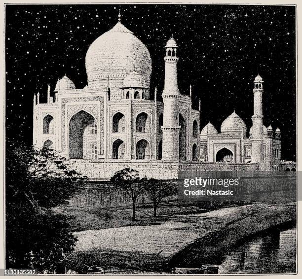 the taj mahal is an ivory-white marble mausoleum on the south bank of the yamuna river in the indian city of agra - garden tomb stock illustrations