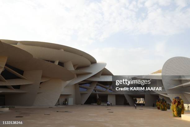 Picture taken on March 27, 2019 shows a partial view of the National Museum of Qatar, desigend by French architect Jean Nouvel, in the Gulf emirate's...