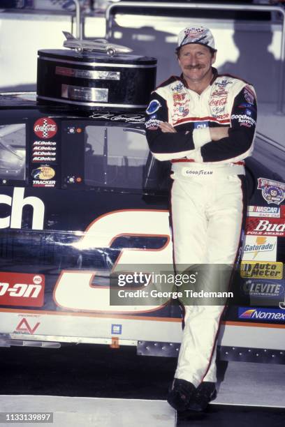 Daytona 500: Dale Earnhardt victorious, posing with trophy on car after winning race at Daytona International Speedway. Daytona, FL 2/15/1998 CREDIT:...