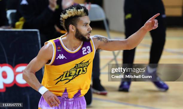 Jordan Spencer guard for London Lions directs play during the British Basketball League match between London Lions and Surrey Scorchers at The Copper...